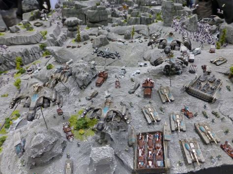 A large battle diorama for Dropzone Commander set in a grey ash wasteland