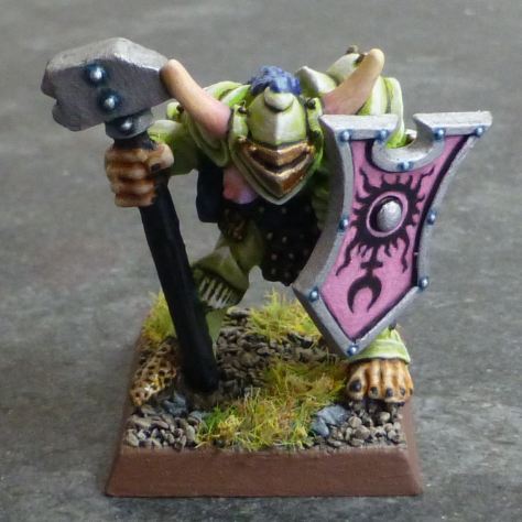 Front of Chaos Warrior of Slaanesh in light green armour with maul and shield