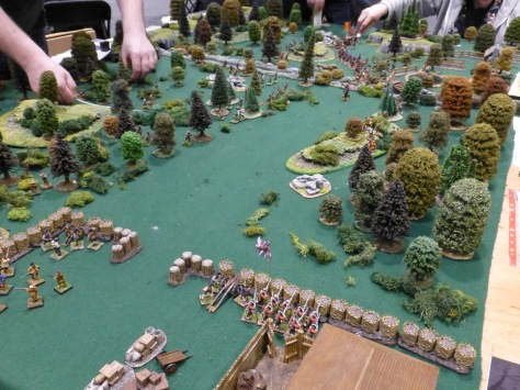 Trading post defender by British troops in a wooded area