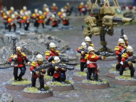 Squad of soldiers in tropical helmets with red jackets and laser rifles