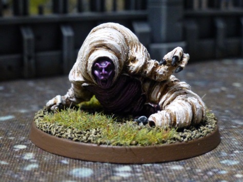 Humanoid maggot with clawed hands
