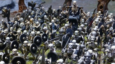 View down onto dense ranks and files of skeleton warriors