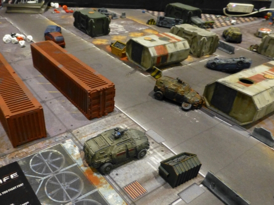 Armoured fighting vehicles amongst industrial terrain