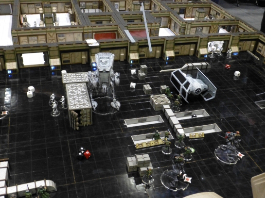 Hangar bay with black floor, stormtroopers, AT-ST and TIE fighter
