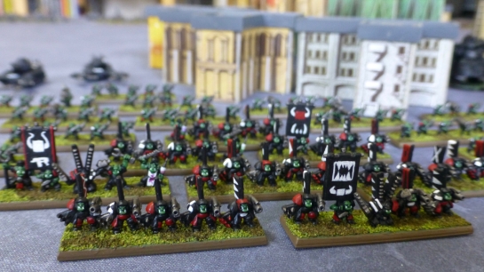 Several bases of 6mm scale Space Orks in power armour