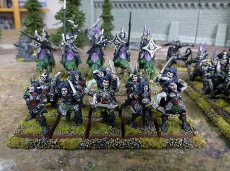 Ten frenzied female Dark Elves wielding sharp blades